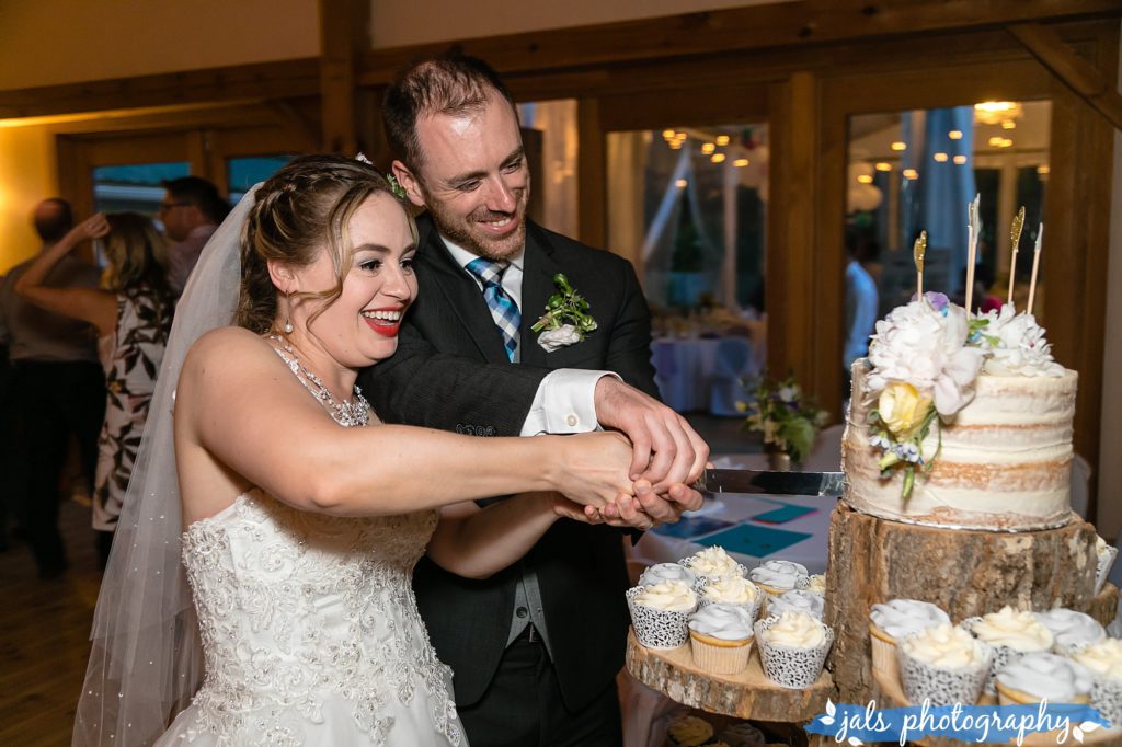 cutting the cake at timber house resort