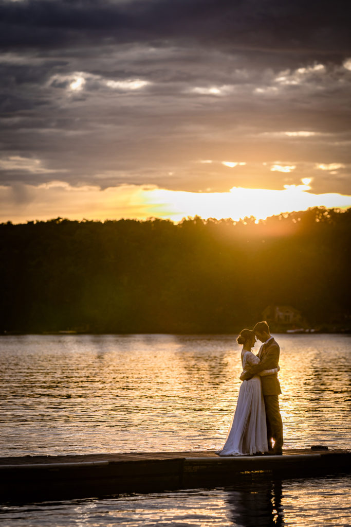 Couple in Haliburton at sunset on their wedding day