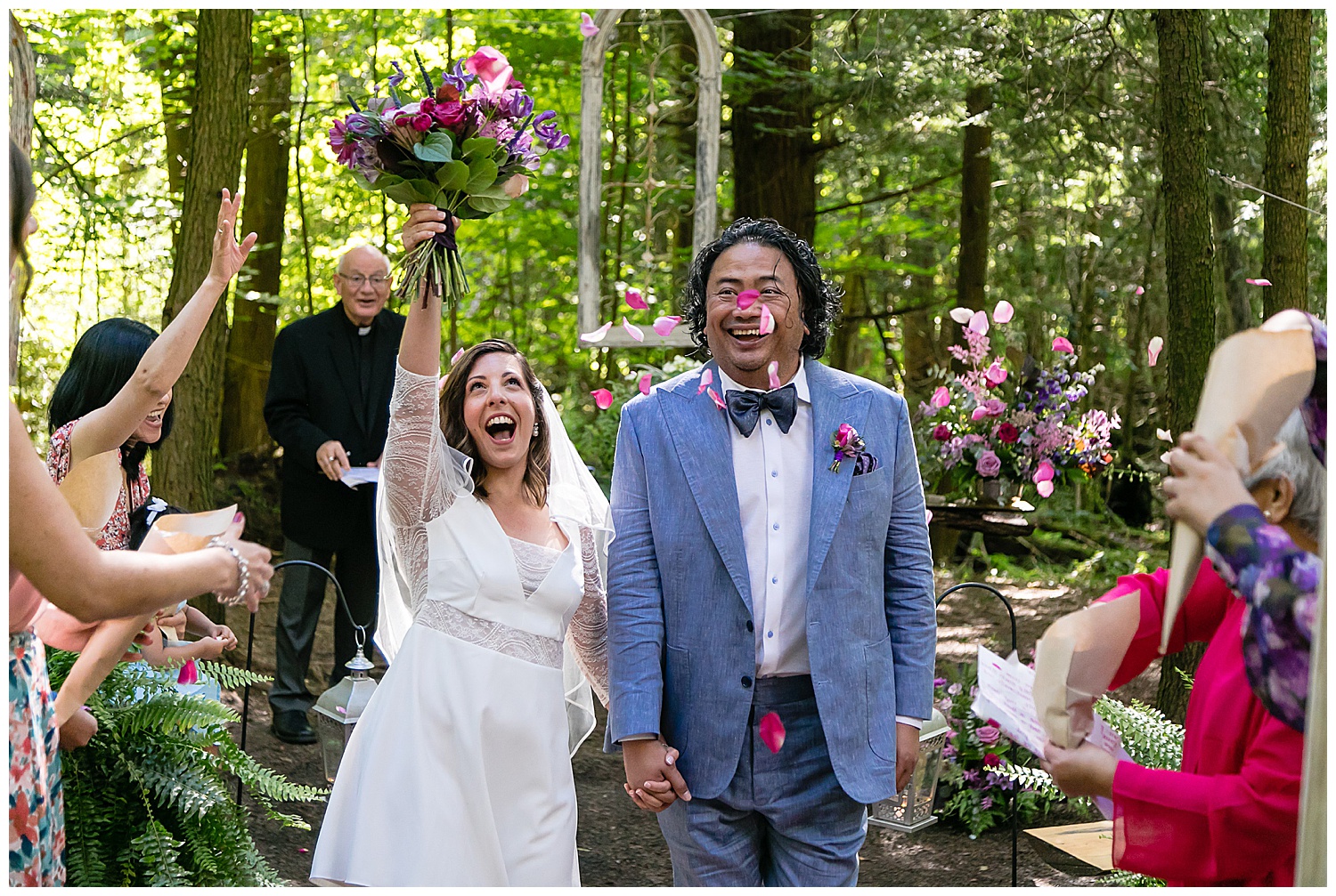 throwing flowers at the end of the elopement ceremony at whispering springs